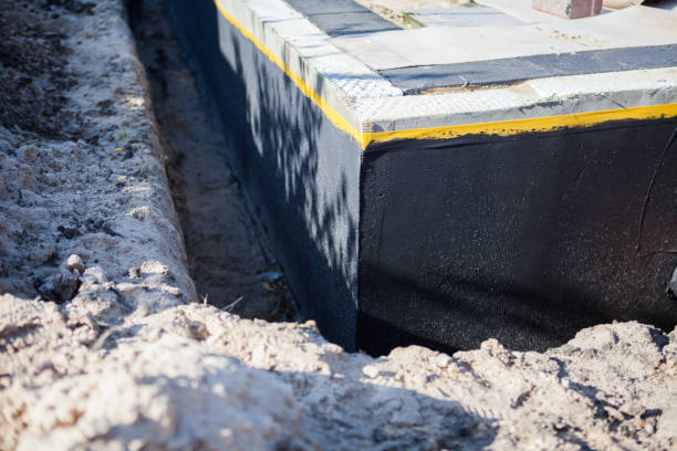 Professional Waterproofing technician working in Tipton, MI